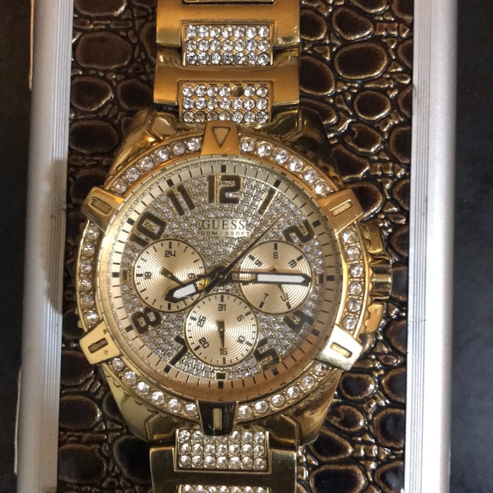 Gold Guess men’s watch